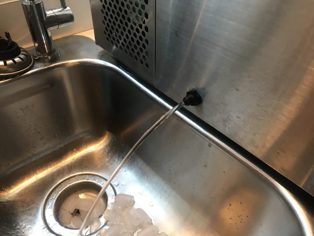 Drain the water out of a portable ice maker