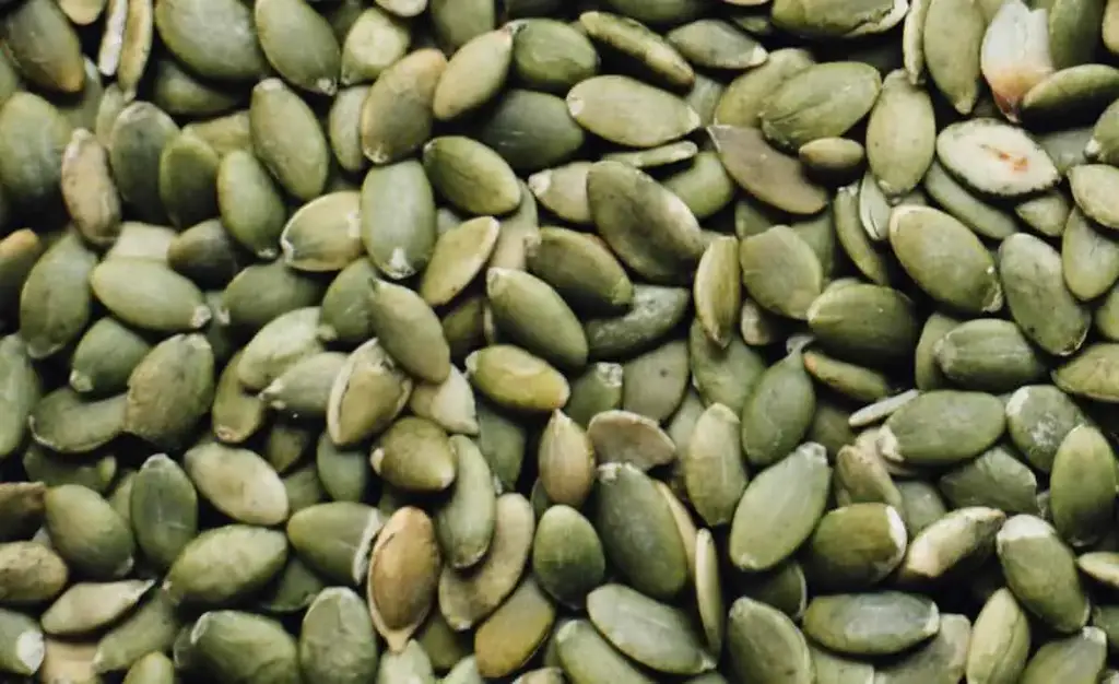 Pumpkin seeds are cheap, and are also a good source of magnesium and zinc.