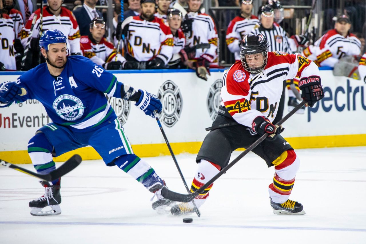 UBS Arena Hosts 48th Annual FDNY Vs NYPD Hockey Game Asiago Hockey AS