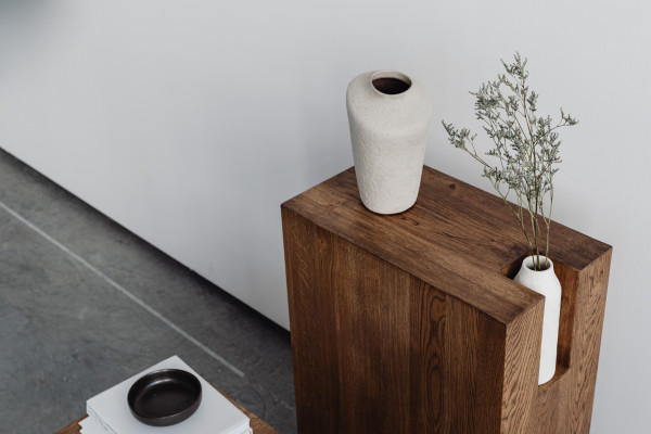 Beautiful minimalist console table with vases