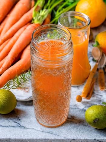 Juice Your Beauty: 6 Recipes for Vibrant Skin and Hair - Carrot-Orange Radiance Elixir preparation and serving suggestions