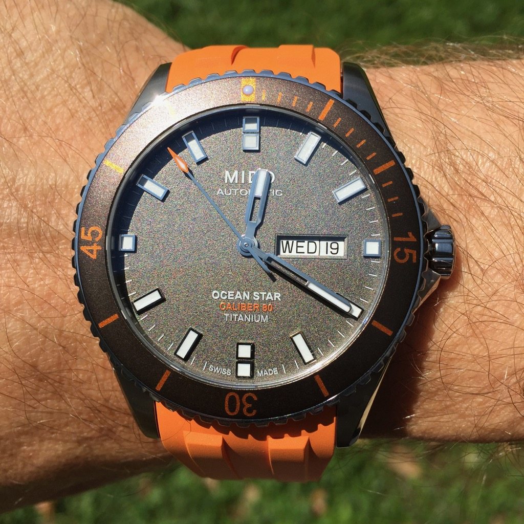 Mido ocean star outlet orange strap