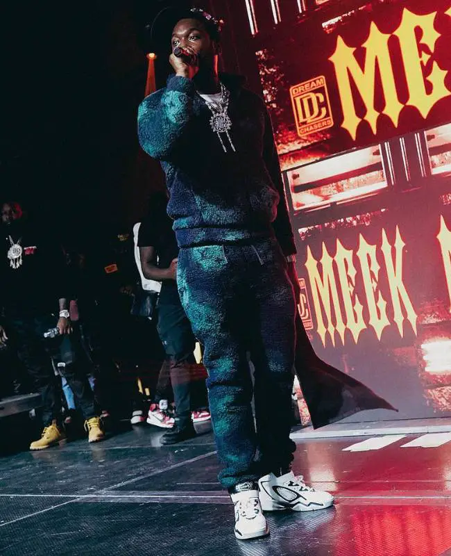 IconicCelebrityOutfits on X: Dress like Meek Mill in the LV Varsity Jacket  with Amiri Camo Bones Jeans and LV × Nike Blue Air Force 1 👉   Brands: #Amiri #LouisVuitton #Nike Items: #