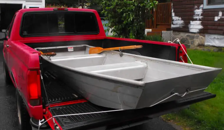 jon boat in the back of a truck how to load legal length etc jon boat planet jon boat in the back of a truck how to