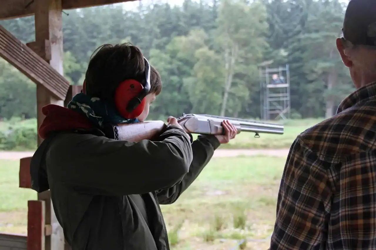 Teenager shooting with a rifle at a gun range in Massachusetts