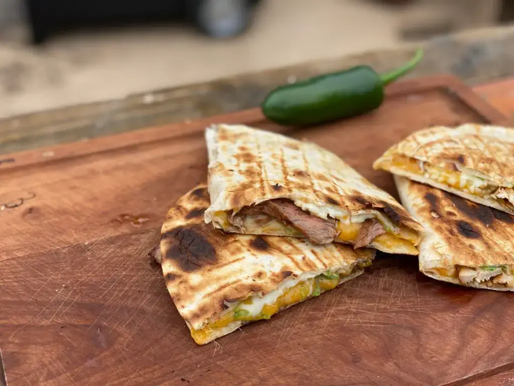 Grilled Cowboy Quesadillas Grilled quesadillas with steak and cheese.