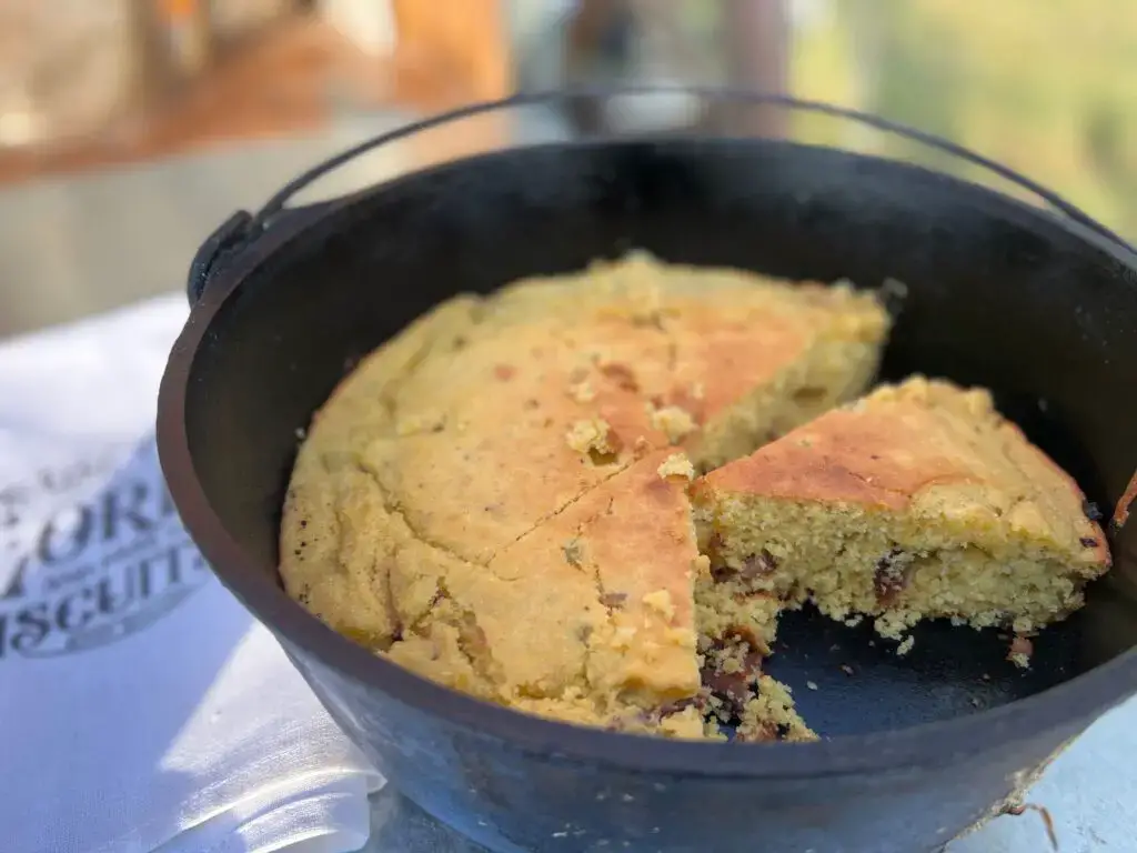 A pan with cornbread in it on the table