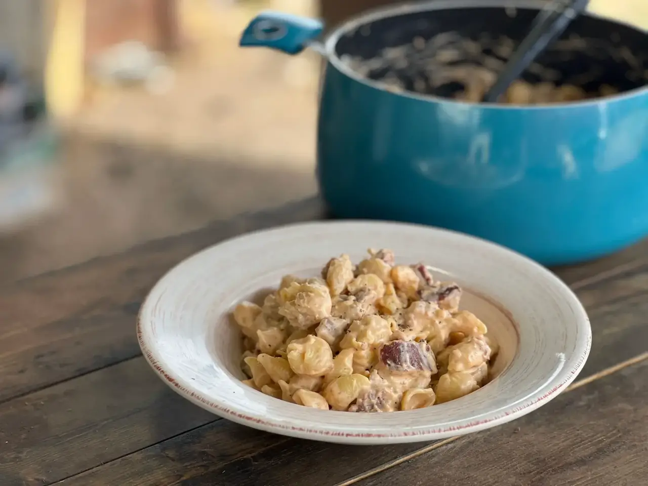 A bowl of food on top of a table.