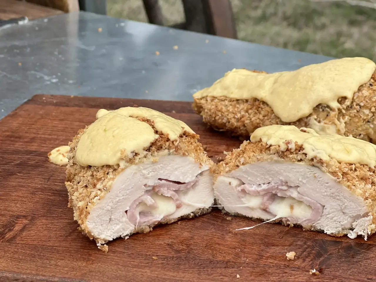 A piece of food sitting on top of a wooden table.