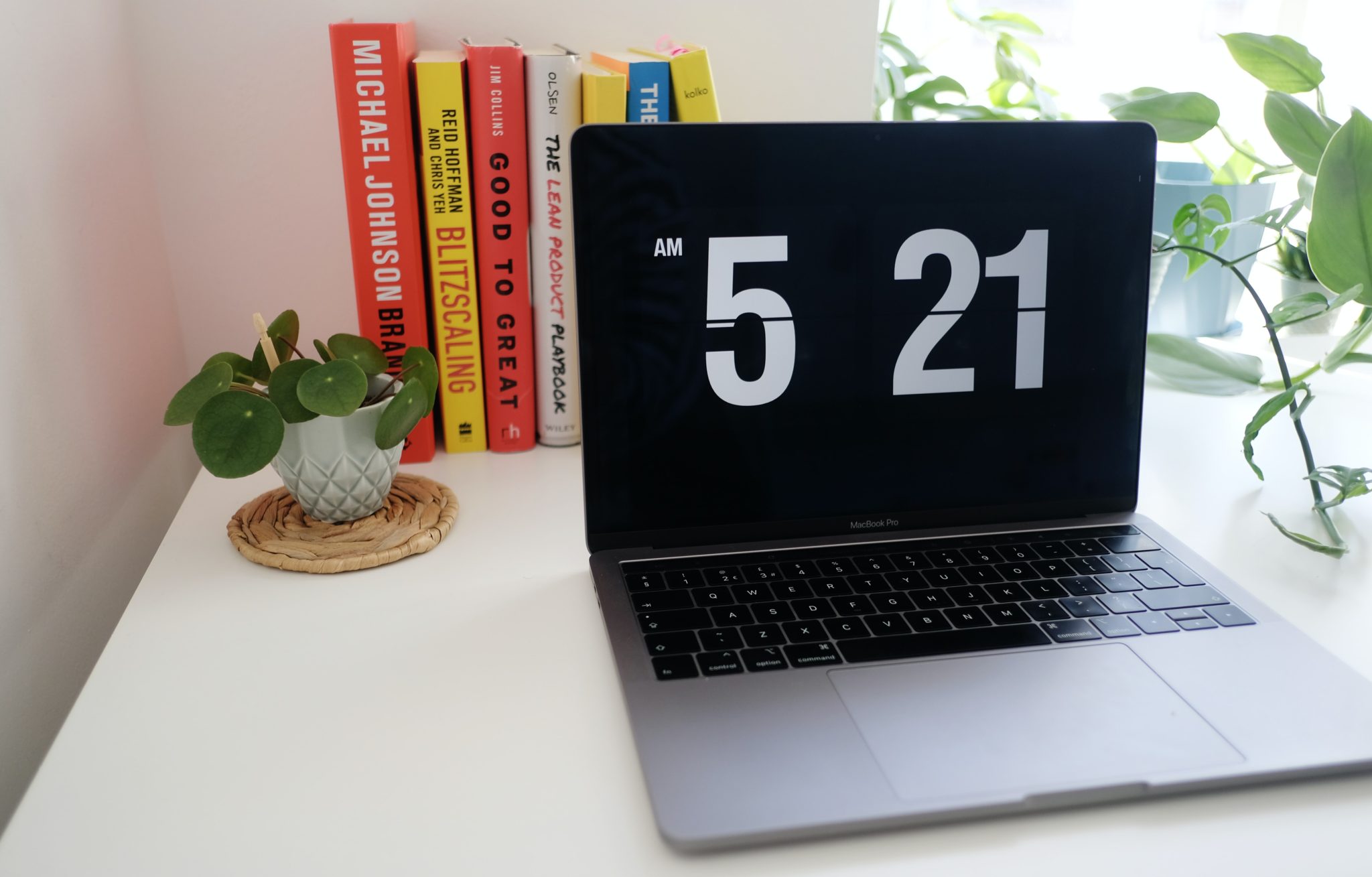 laptop showing digital clock