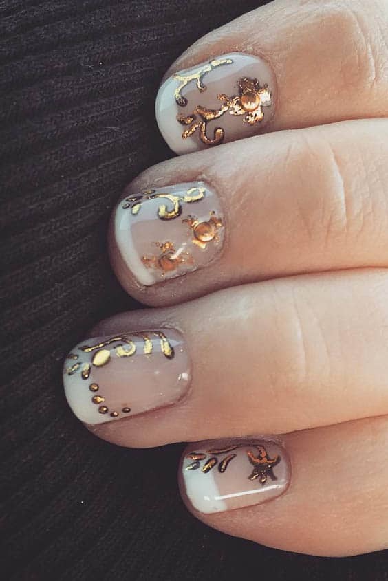 Tanya Inspires on X: White nails with gold flakes   #nailart #naildesign #nailflakes #nails #whitenails #manicure   / X